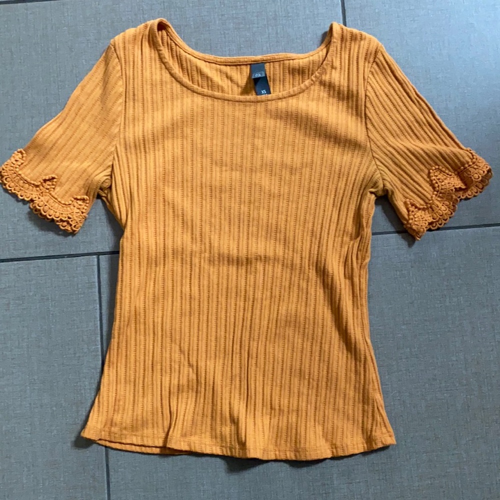 Orange shirt with lace sleeve detail